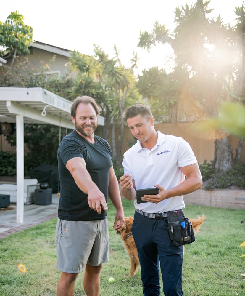 Technician reviewing inspection with customer