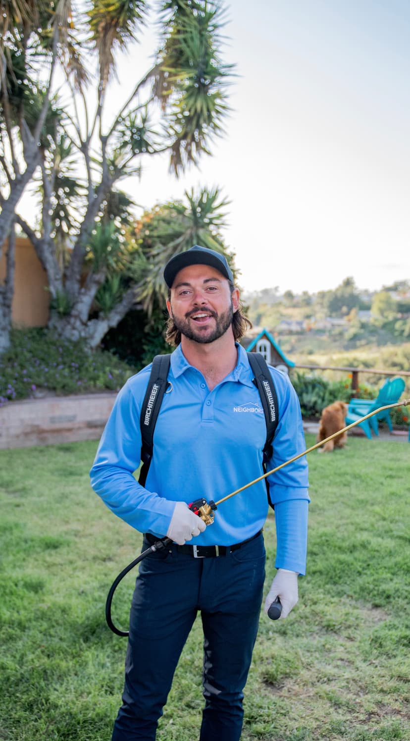 Neighbors Pest Solutions technician on the job